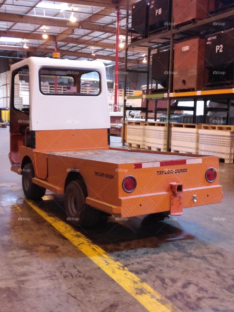 Electric vehicle for warehouse