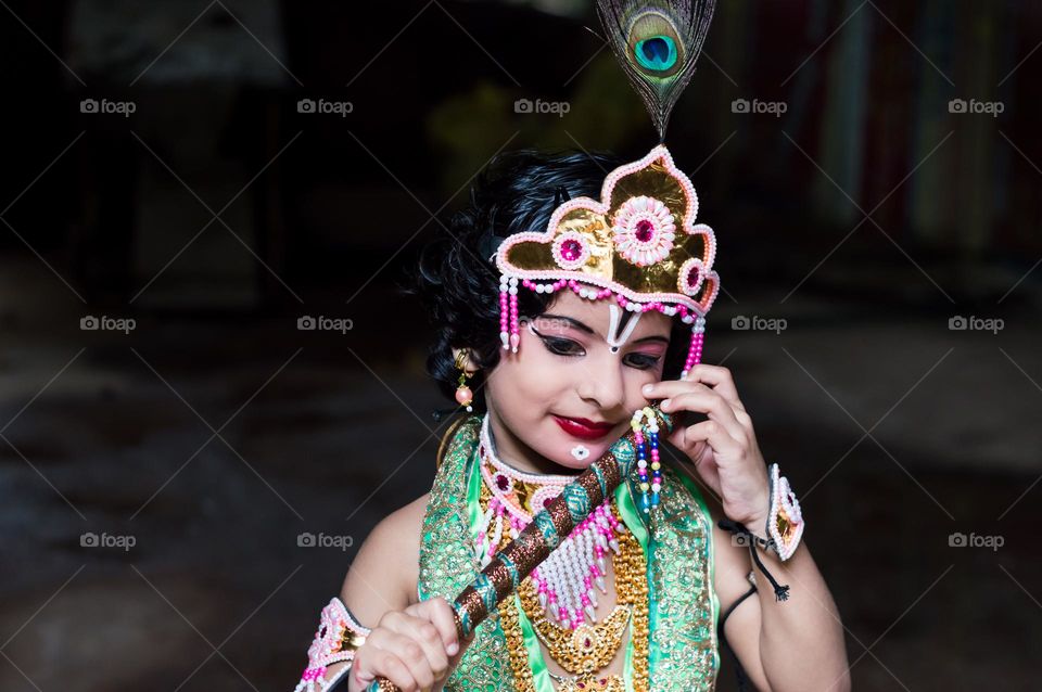 A popular fancy dress character in India,"Shri Krishna".