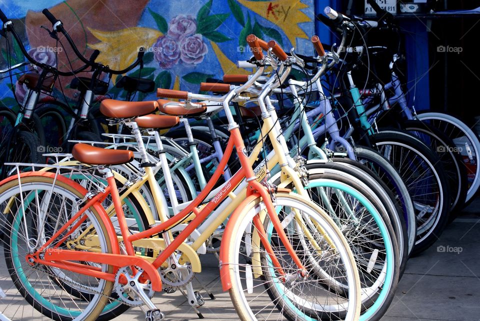 Bikes lined up ready for rentals on the Venice Beach Boardwalk