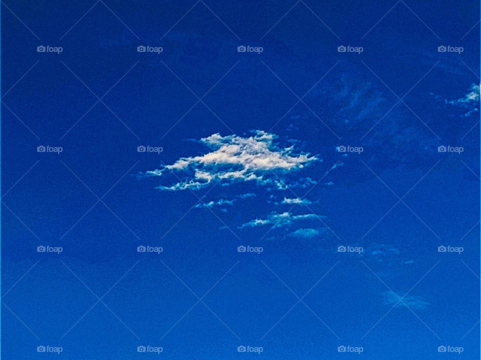 I want to show white clouds and blue sky in this photo.  The sky looks very beautiful with clouds and blue sky.