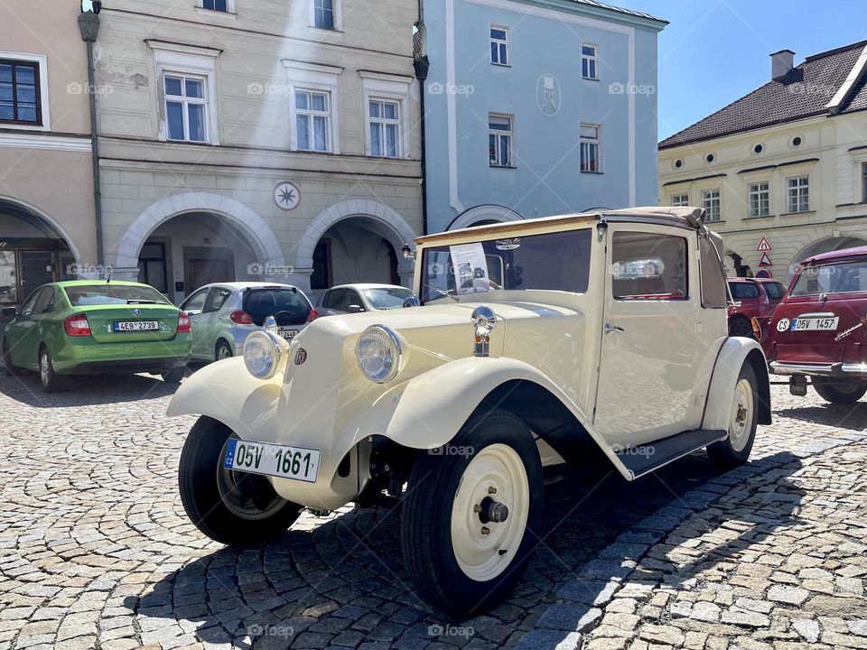 White retro car outdoor at sunny day 