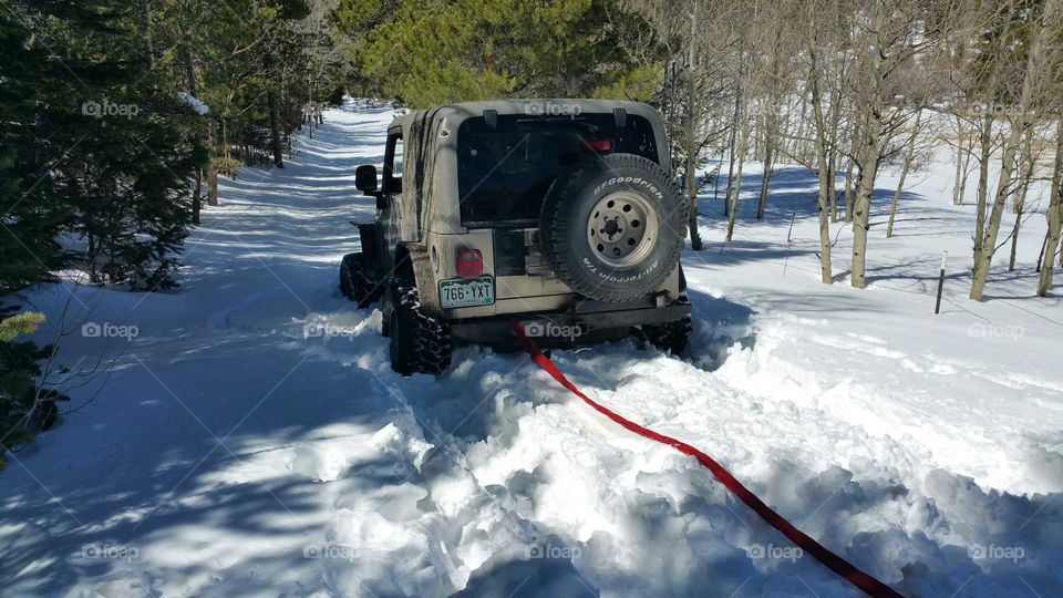 Getting pulled out of the snow