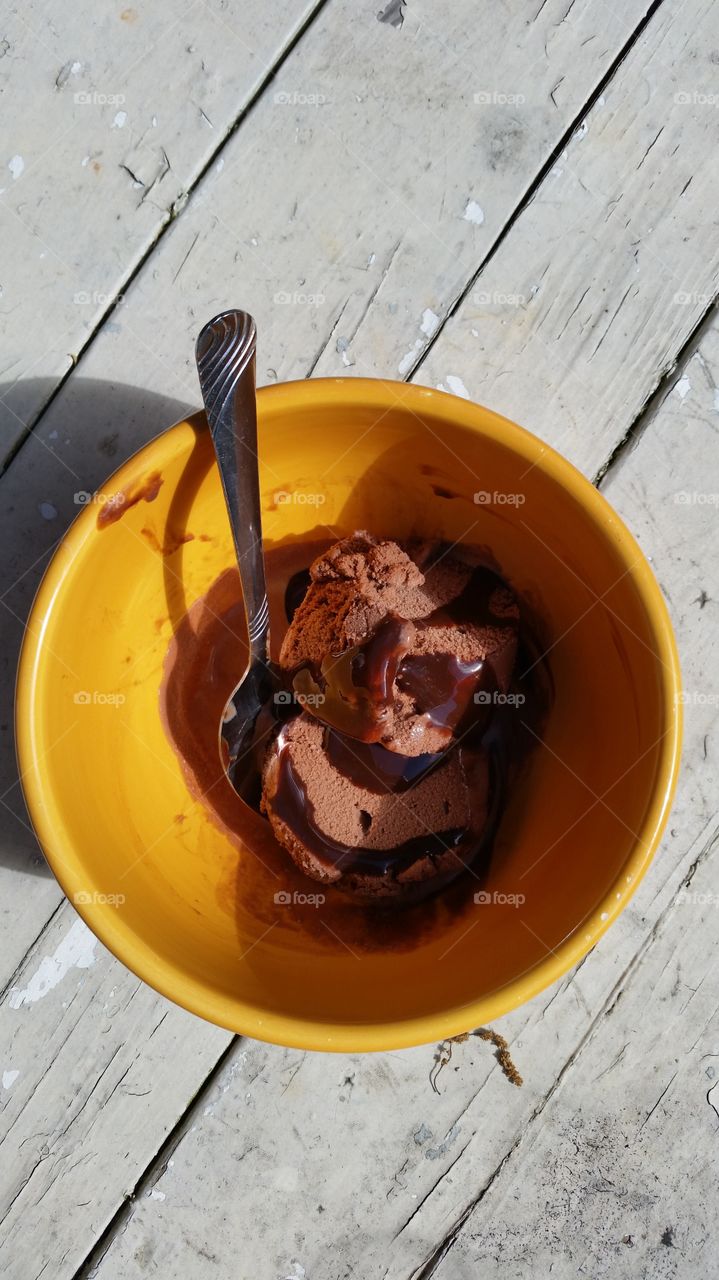 Chocolate ice cream with chocolate syrup