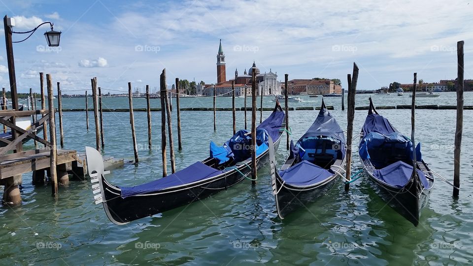 three gondolas in Venice