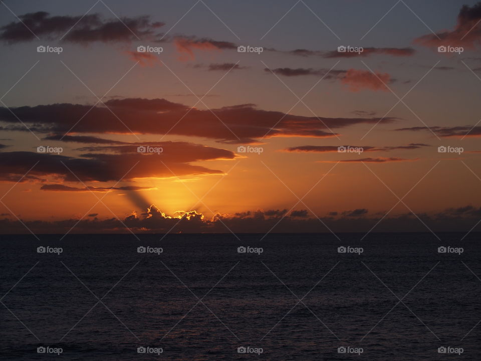 Dramatic sky over sea at dusk