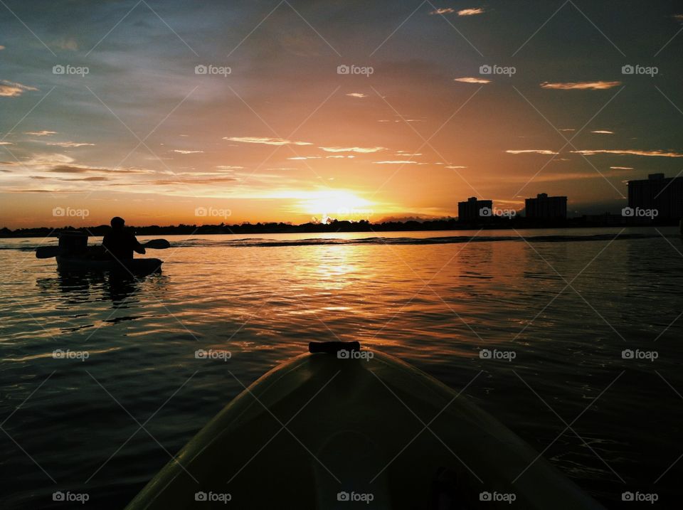 Sunset. Kayaking in the Bay