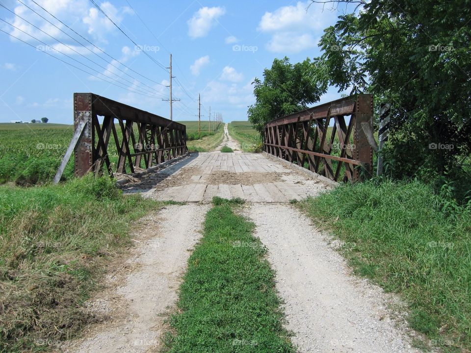 Interesting bridge on rural Iowa road over a small creek. 