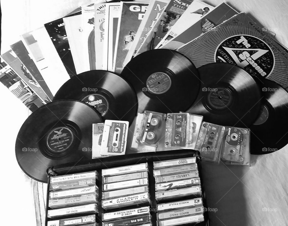 vinyl and cassettes in black and white