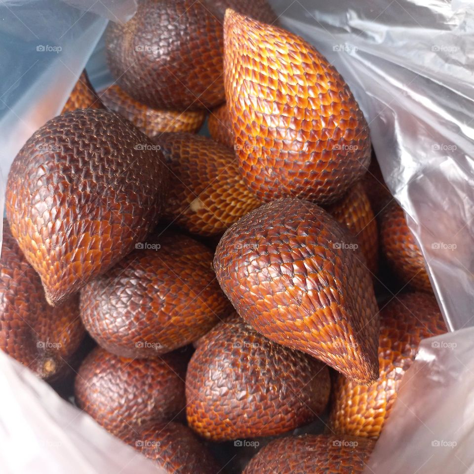 Salacca zalacca is a type of palm fruit commonly eaten