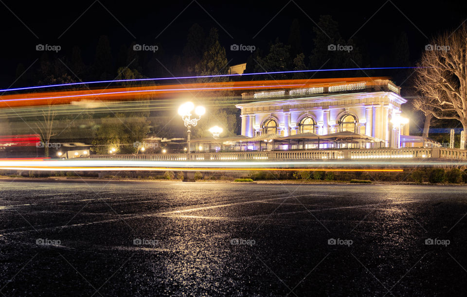 La Loggia restaurant at Piazzale Michangelo in Florence by night with light trails