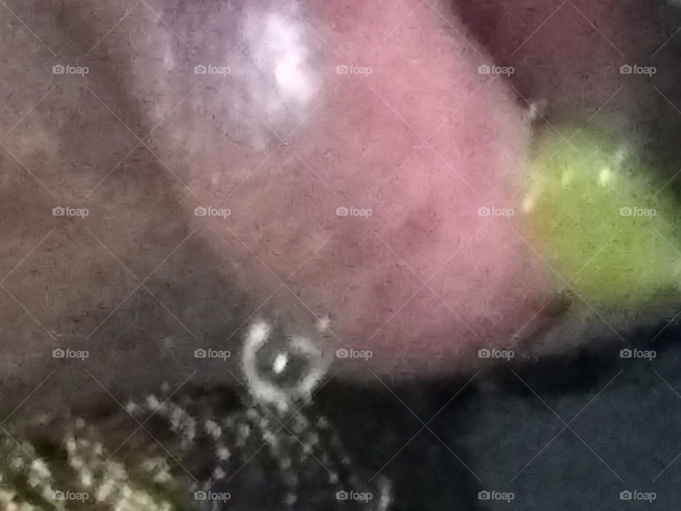 The sweet nectar of canned peaches as seen on lips.