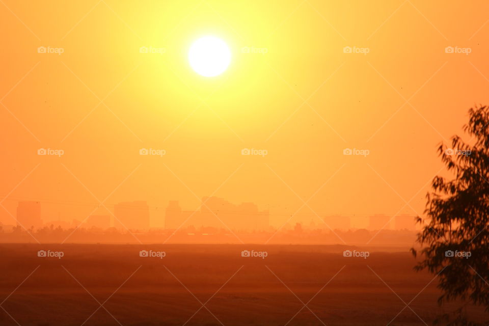 sunrise, a majestic sunrise rises over the city.