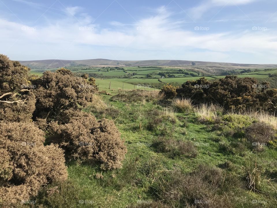 Porlock on Exmoor with beautiful sunshine prominent here, shows off all the contours of this Somerset landscape.