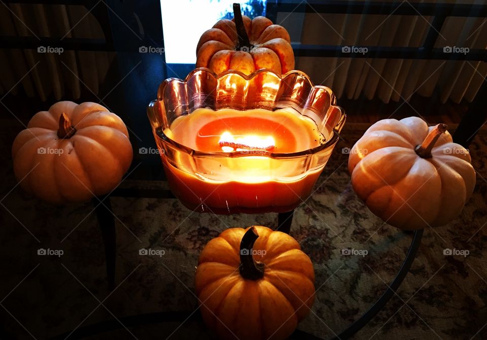 Pumpkins and candle centerpiece for fall 