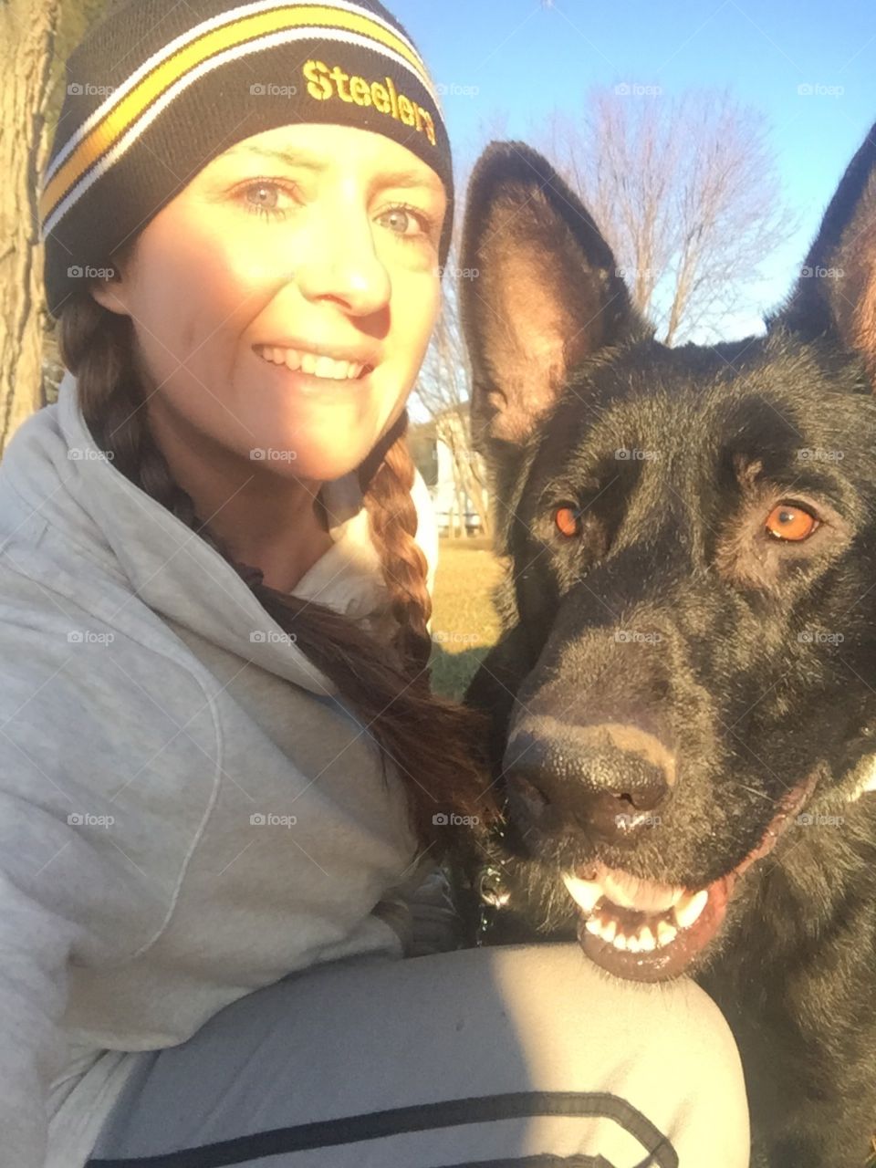 Smiling woman with dog