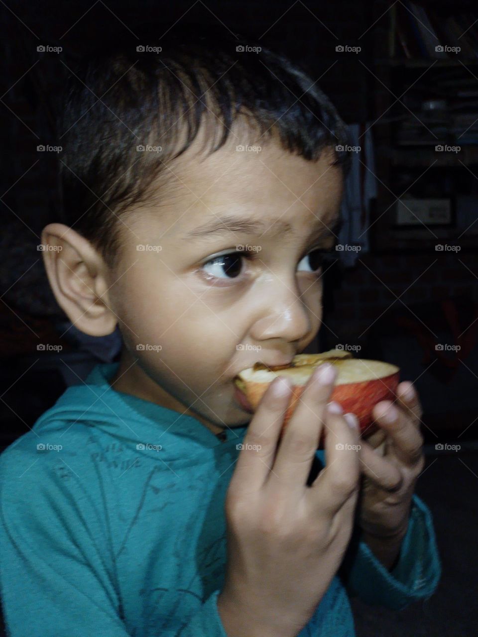 boy eating apple