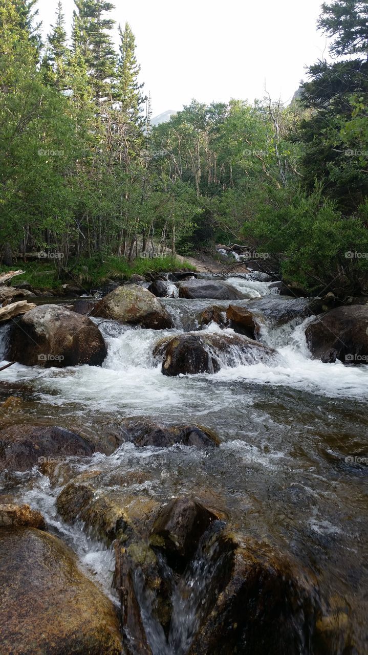 I have always been captivated by rivers and streams and find myself at peace near them.  I was relaxing here and took a few shots of this amazing area in the Rocky Mountain National Park.