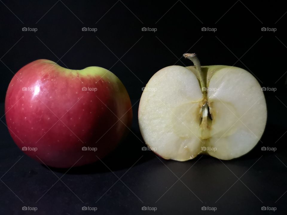 Apple on the black background