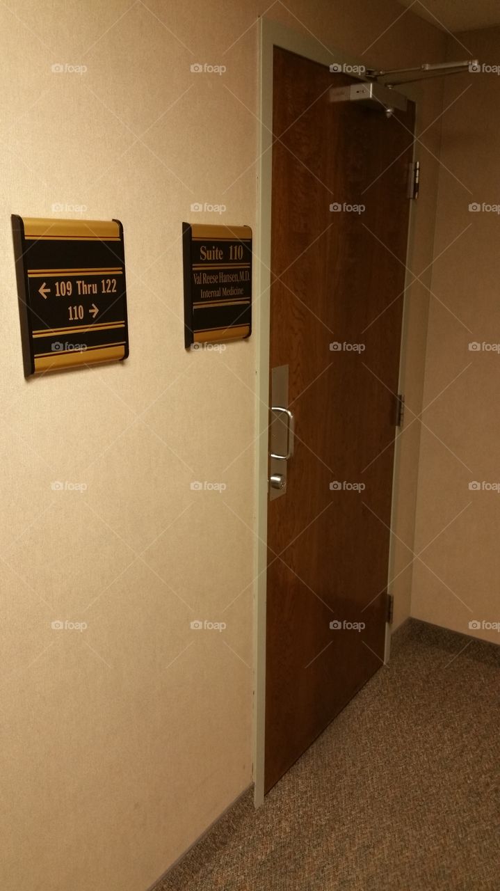 odd signs and office door