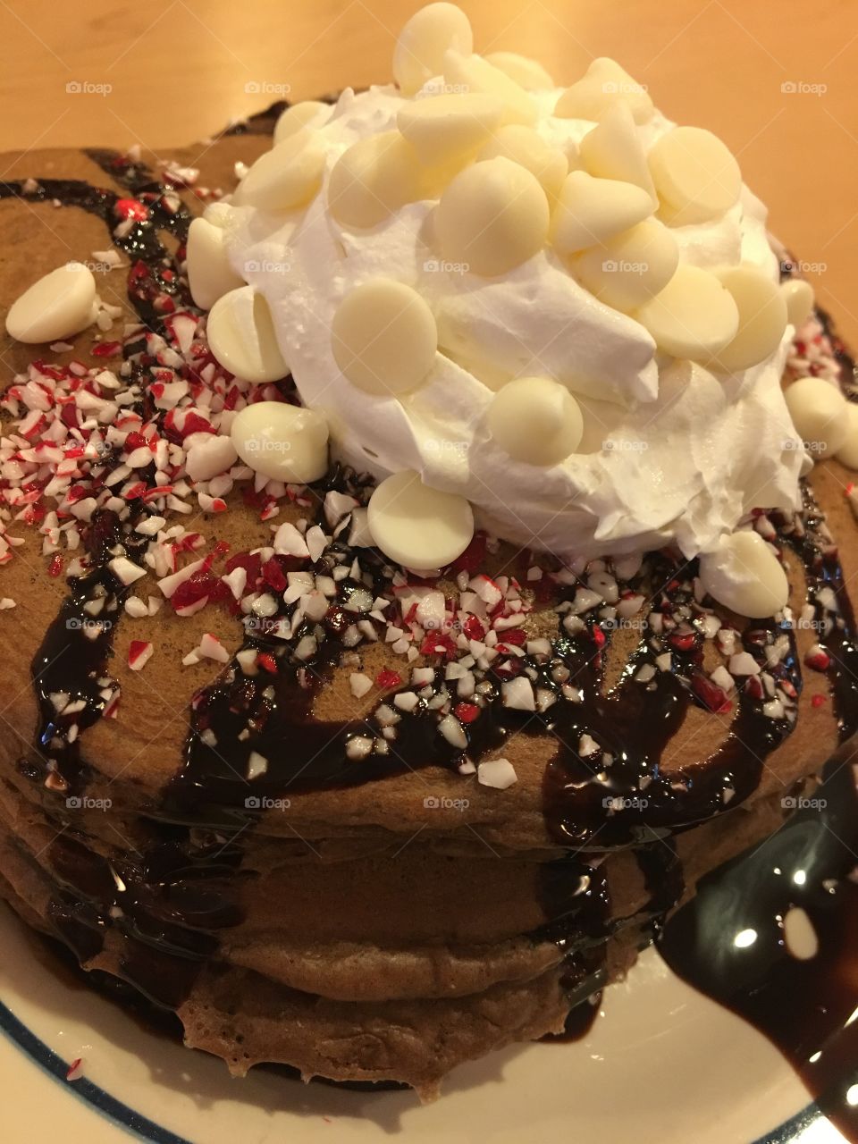 Chocolate Peppermint Pancakes with White Chocolate Chips, Chocolate Syrup and Whipped Cream 