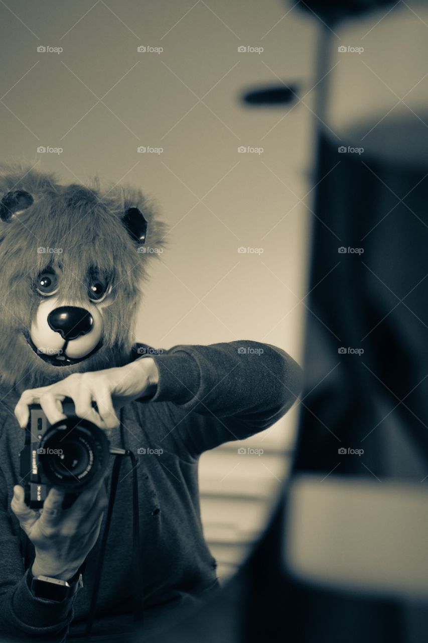 Monochromatic Bear Holding A Camera, Bear Taking A Selfie In The Mirror, Fujifilm Camera Gear With A Bear Mask