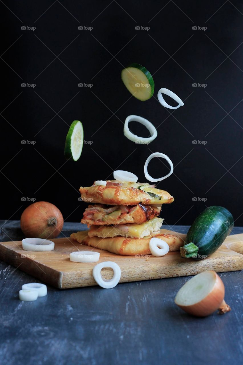 Pizza and flying onions