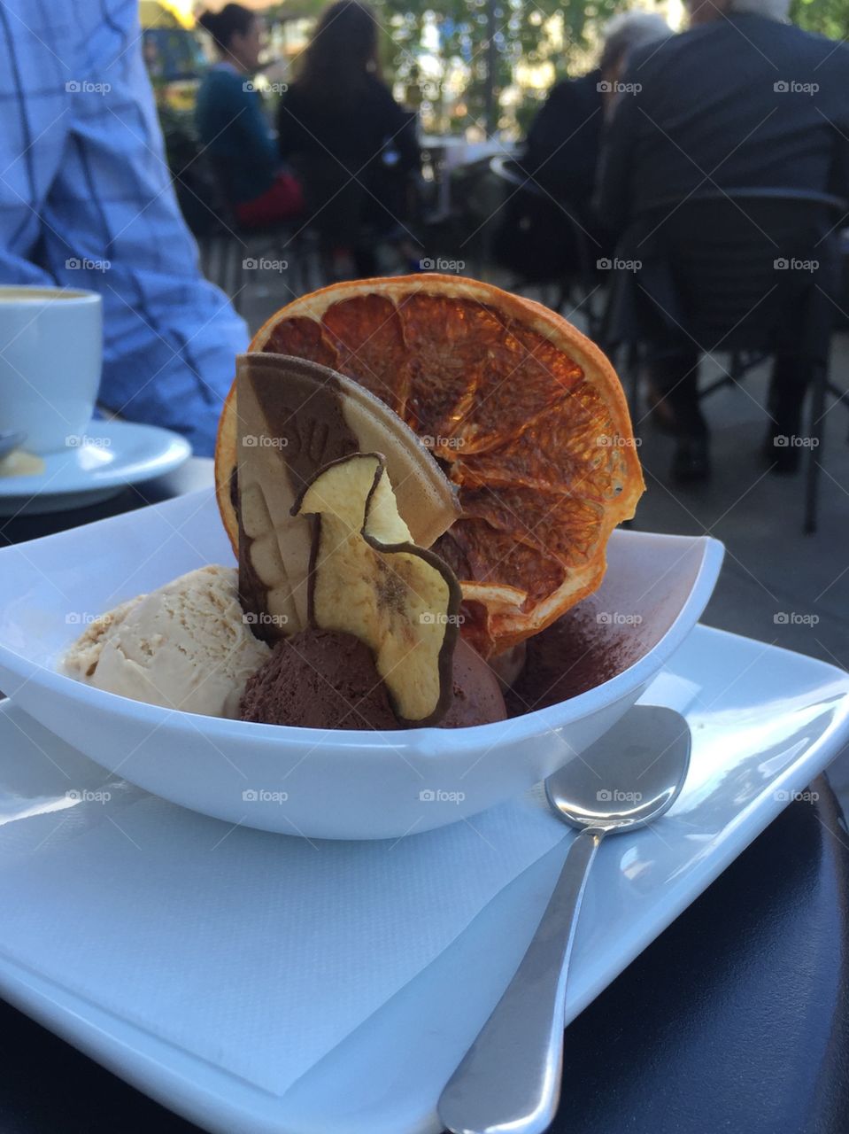 Ice cream with dried fruit at a street cafe in Torino