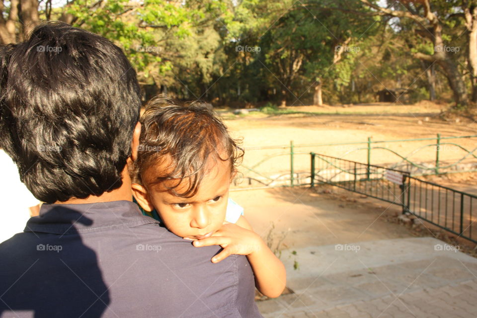 On dads shoulder