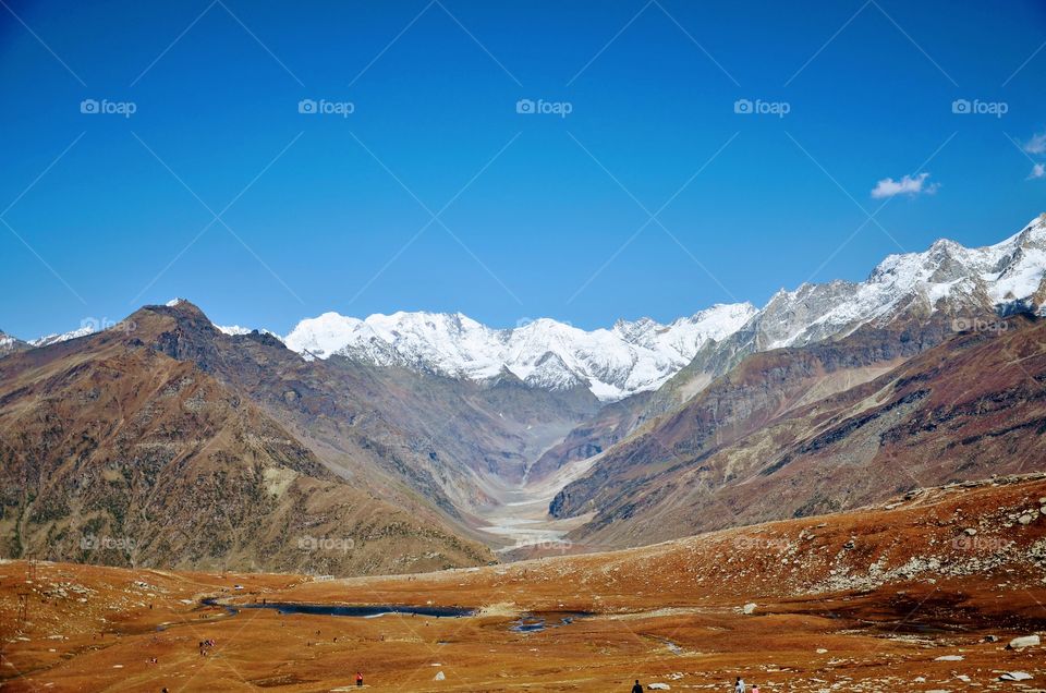 The mountains cross the border between India and China at rothangpass in himachal paradesh India 