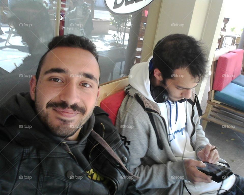 this a photo of me and my friend we took while studying for the exams in winter and having great fun