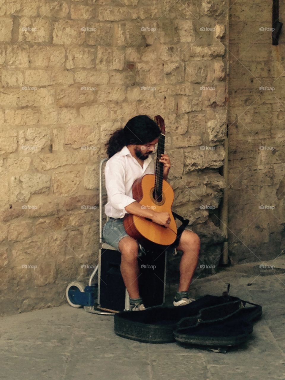 Musician. A musician on the street at Perugia