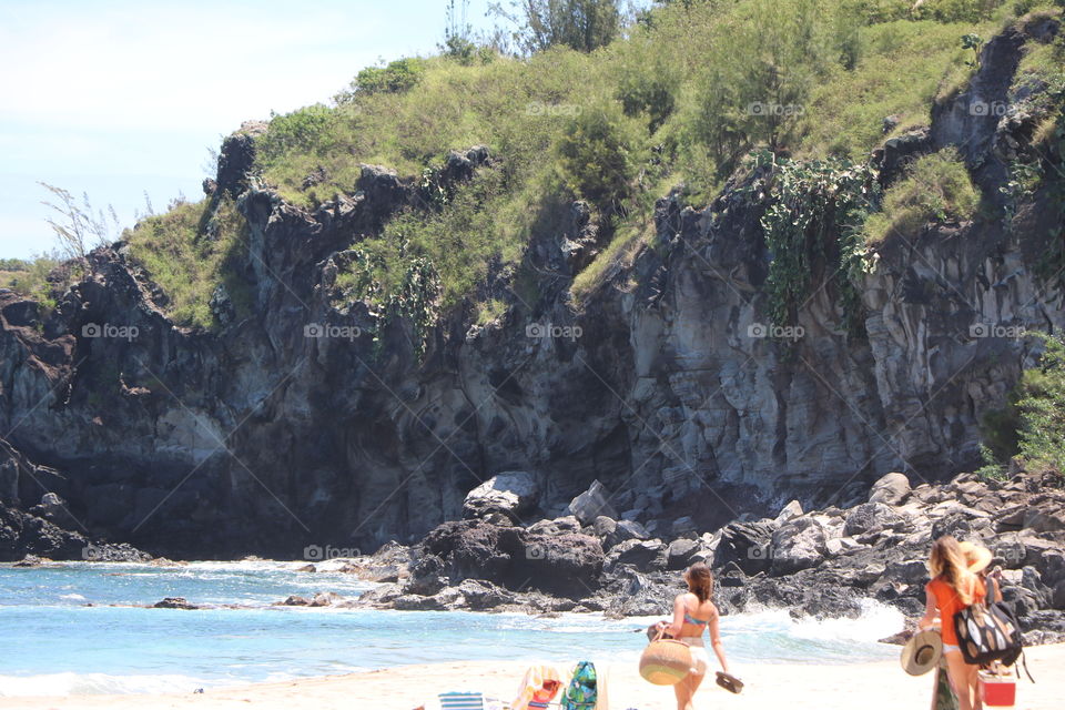 Friends coming together on the beach - time for some summer fun