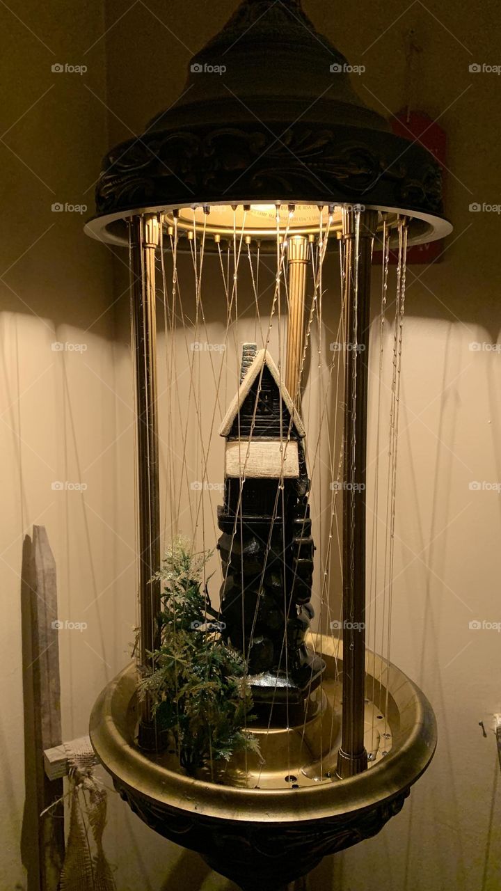 A vintage piece from the 1970’s, for a collector’s pleasure. An oil lamp, or a “rain lamp”. This one is a mill, with a moving paddle wheel.