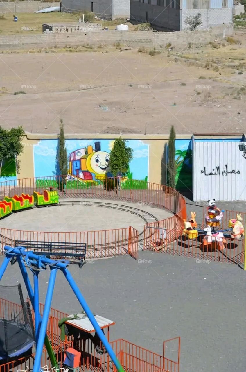 A very beautiful picture, and there is no better picture than it. There is no better picture of green herbs and colorful, red and white roses than it. Glory be to God, the natural and picturesque view, and there is no more