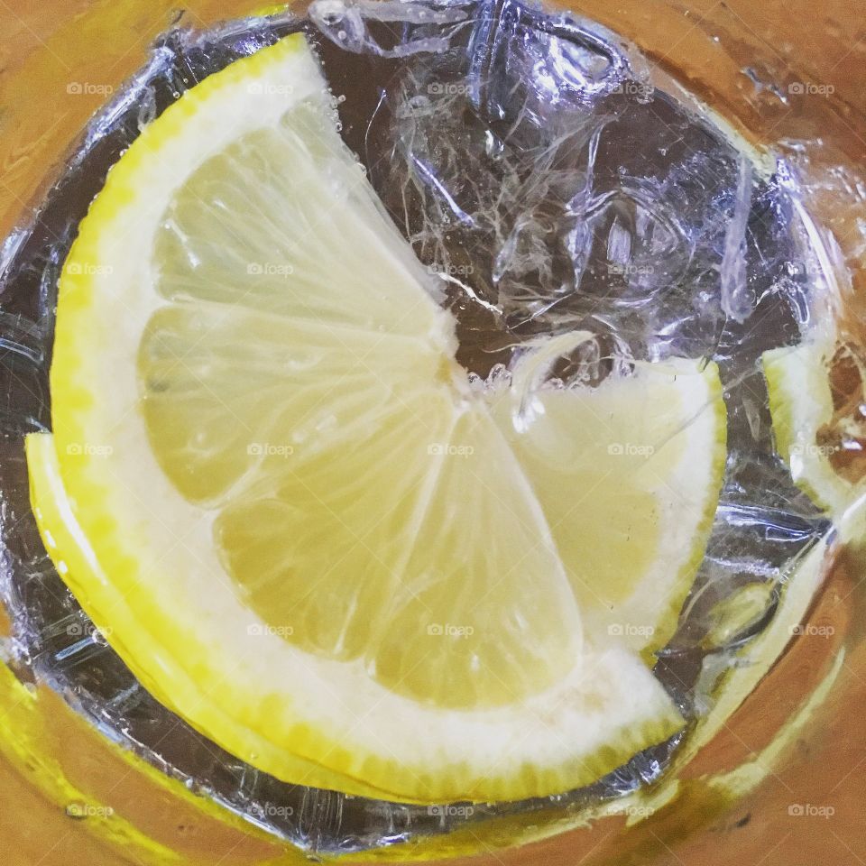 Gordons gin and tonic with ice and a slice of lemon 