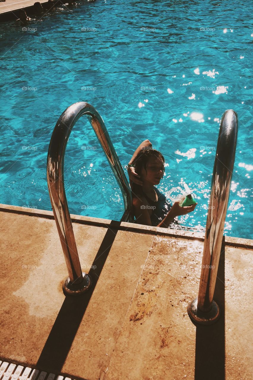 Young woman in swimming pool