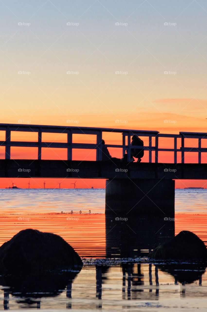 Chatting on the jetty