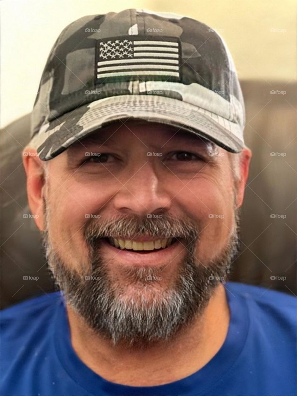 Happy Man in a US Flag hat.