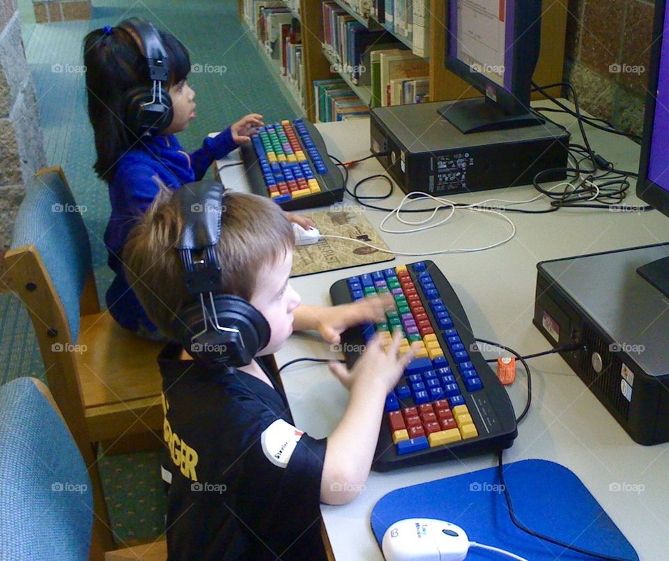 My favorite gadgets, two children on computers 