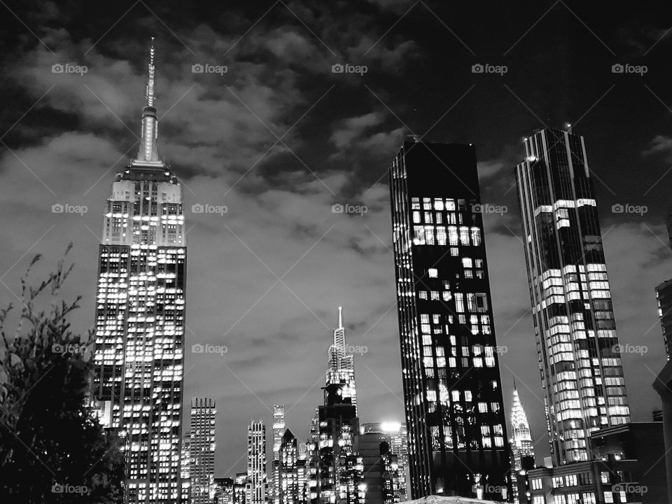 The skyline of lower Manhattan including the Empire State Building on a crisp clear fall night