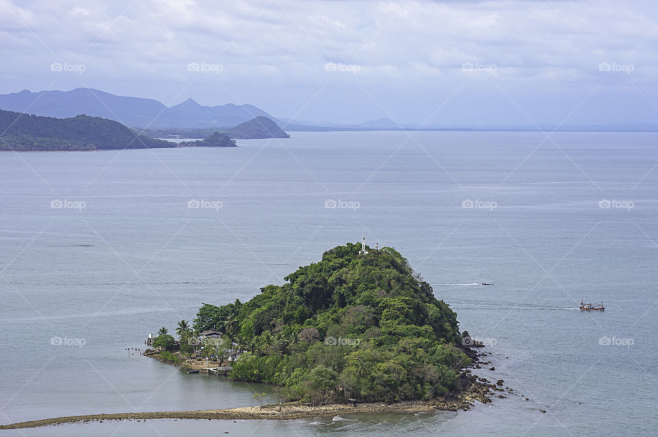 The beauty of the Ko Mattaphon and the fishing boats in the sea at Chumphon in Thailand.