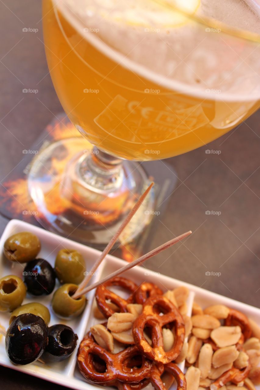 Beer and appetizers served in a bar in Paris.