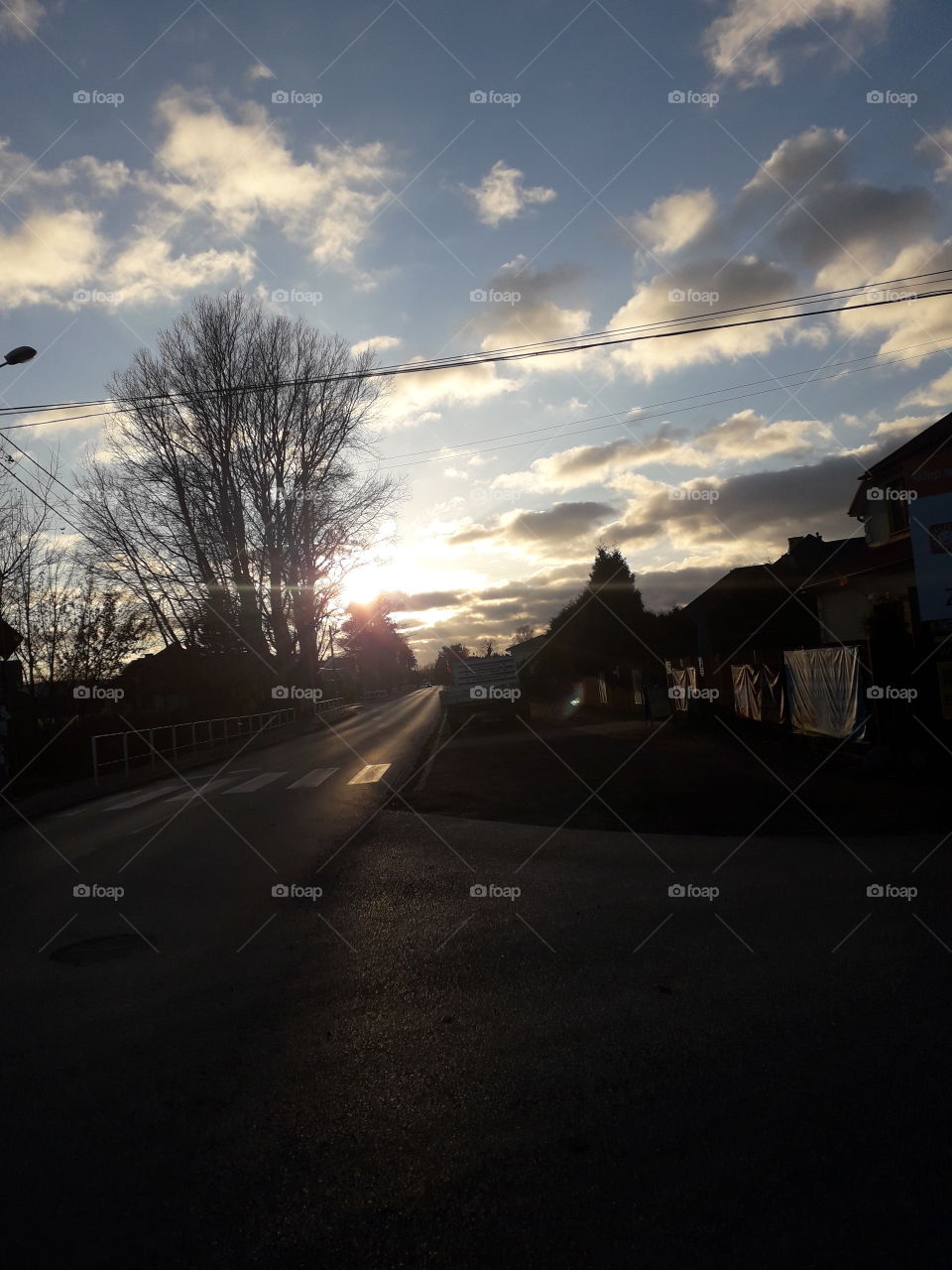 perspective matters - crossroad in a village at sunset