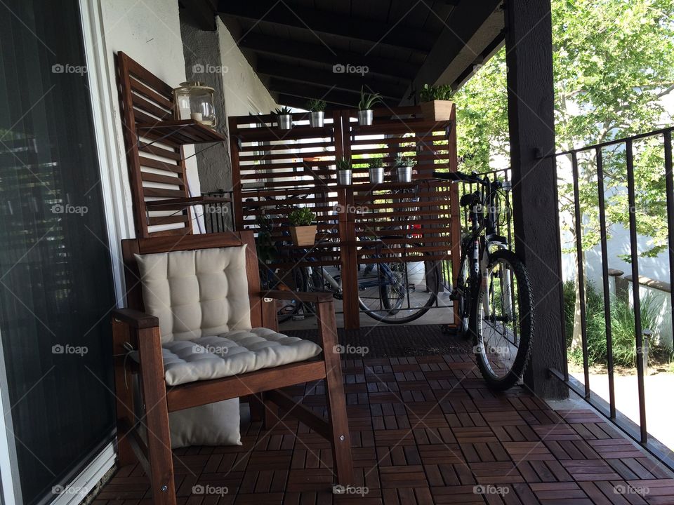 Empty wooden chair in patio