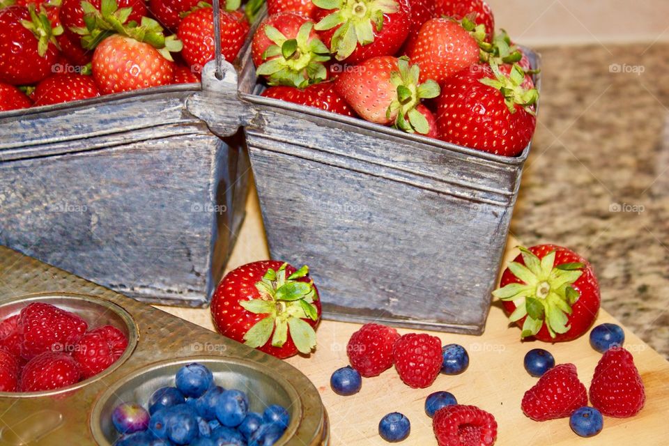 Fresh strawberries in bucket