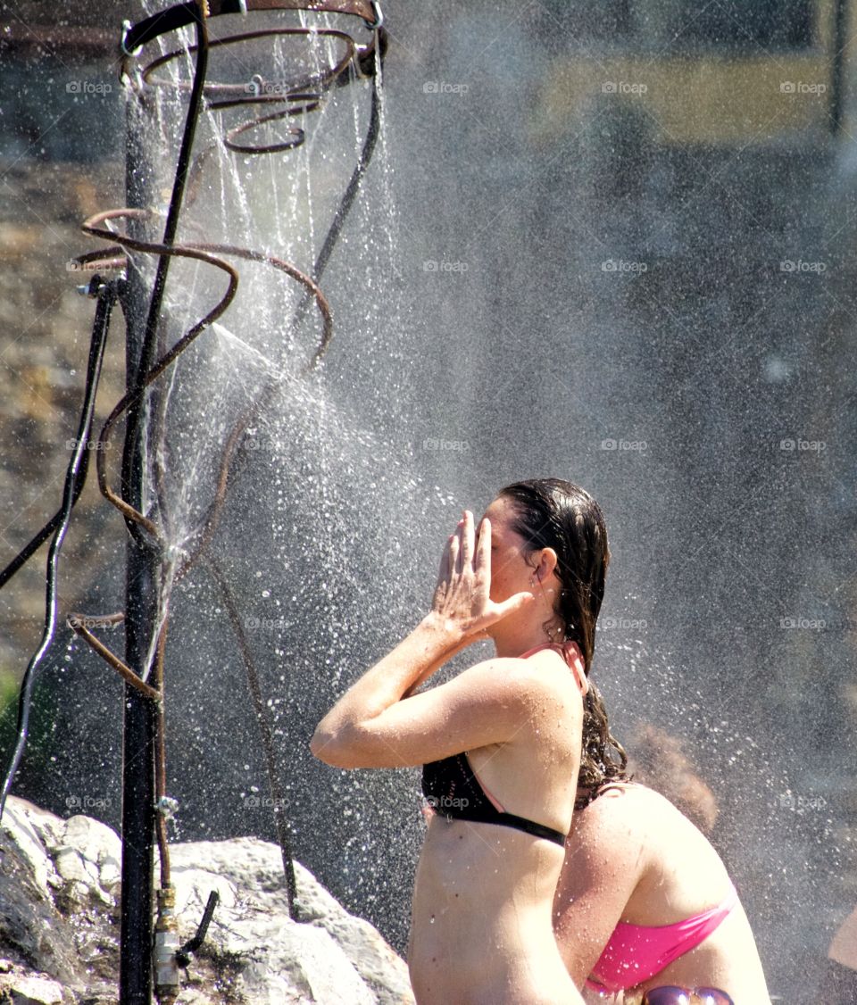 Summer shower at the beach