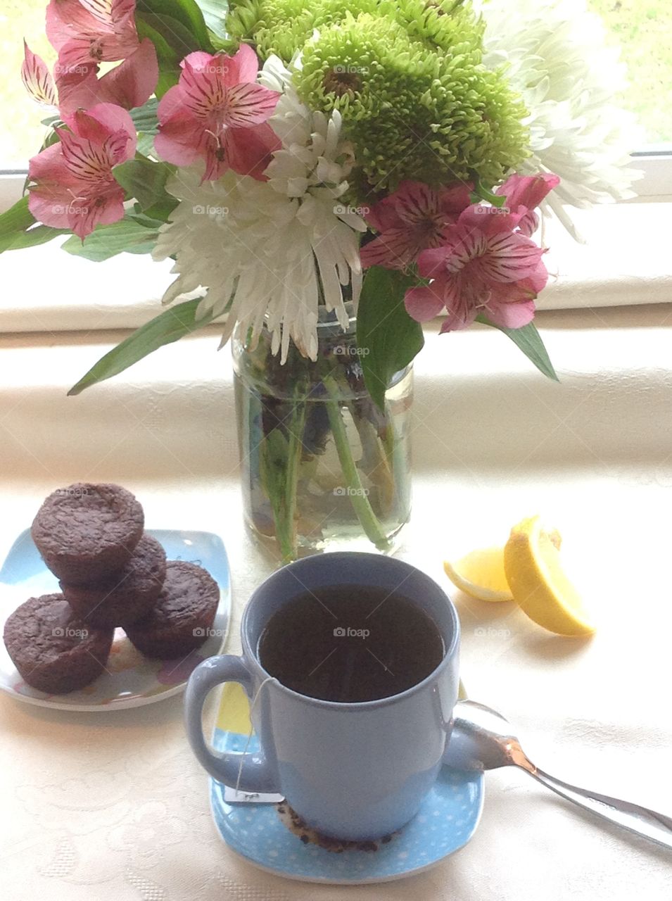 Having a cup of tea outdoors enjoying the beautiful Spring weather.