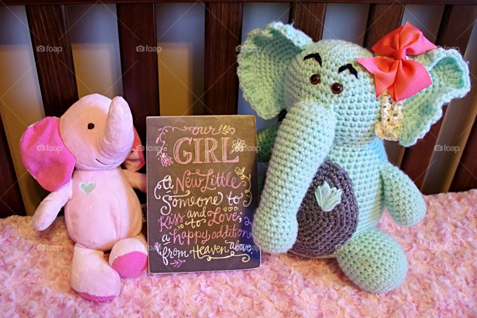 welcoming a new baby girl with a pink and blue elephant