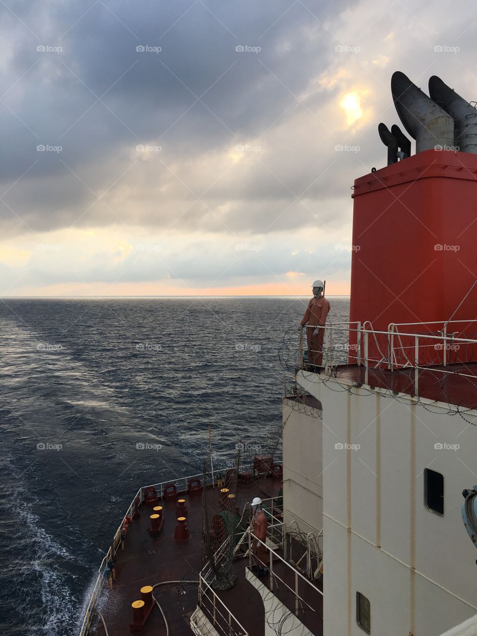 This photo was taken while we transit at the International Recommended Transit Corridor (IRTC) in Gulf of Aden between the sea of Somalia and Yemen. Dummies and razor wires are installed to merchant ships to deter Pirates from boarding the ship.