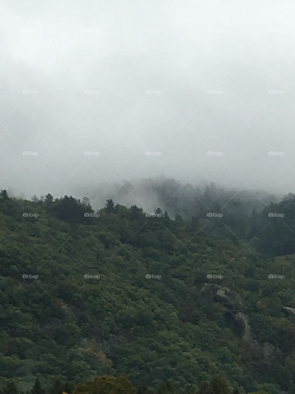 Misty mountains in October weather